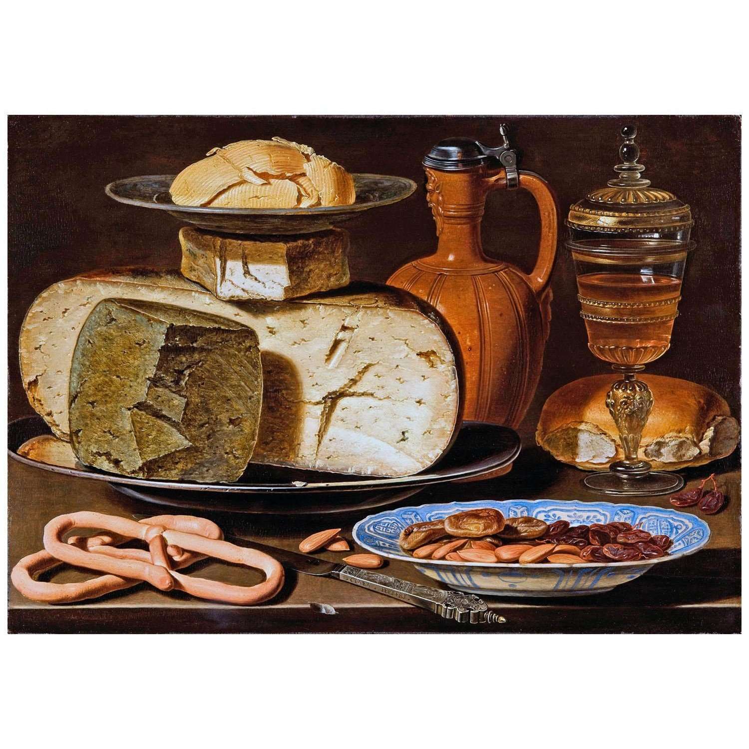  Clara Peeters. Still-life with Cheeses, Almonds and Pretzels. 1615. Mauritshuis Den Haag
